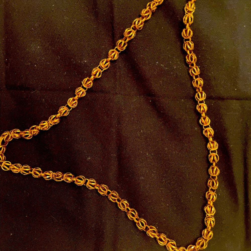 Tiffany & Company. 18 k Gold necklace. Signed